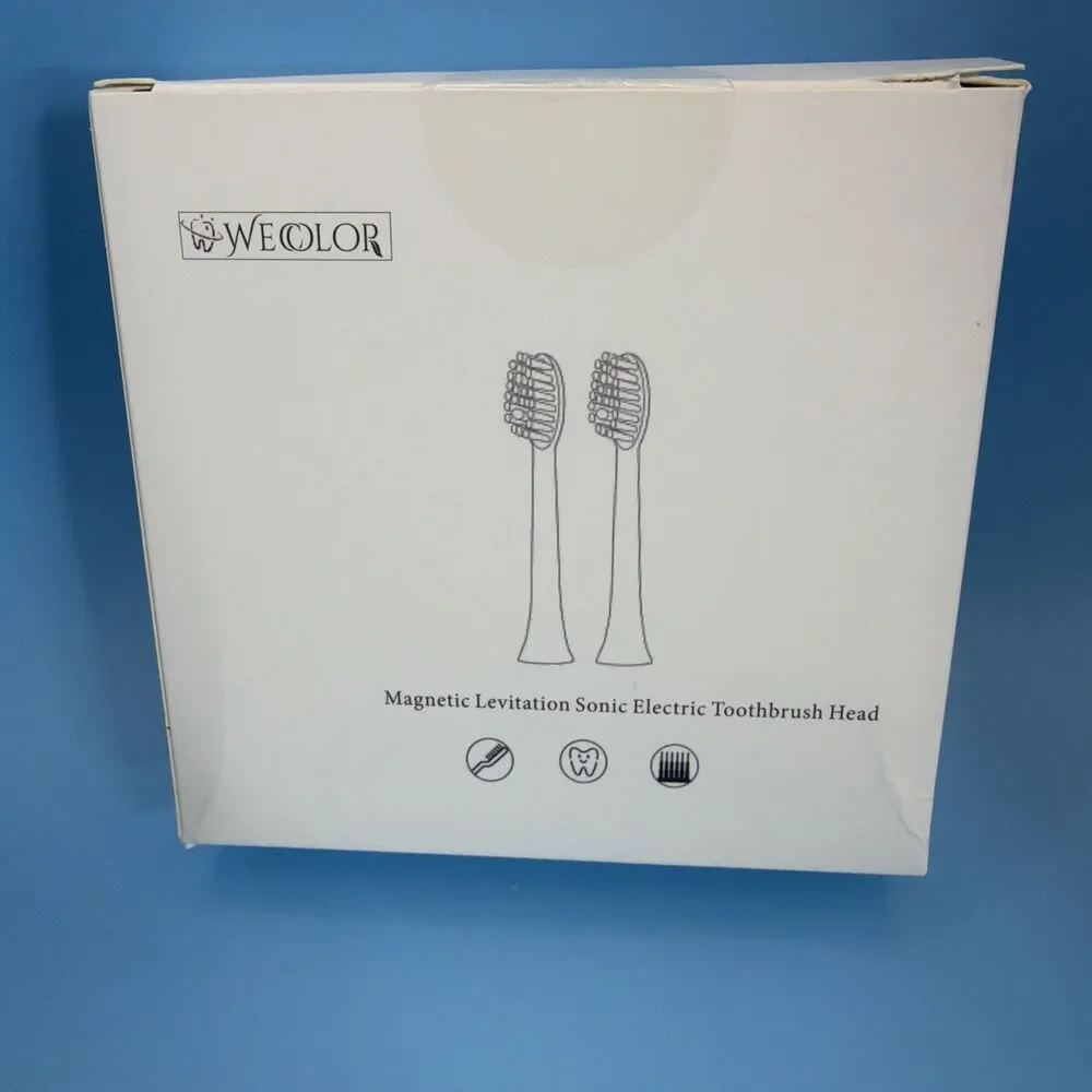 Wecolor Sonic Electric Toothbrush with 4 Replacement Heads. Color Green
